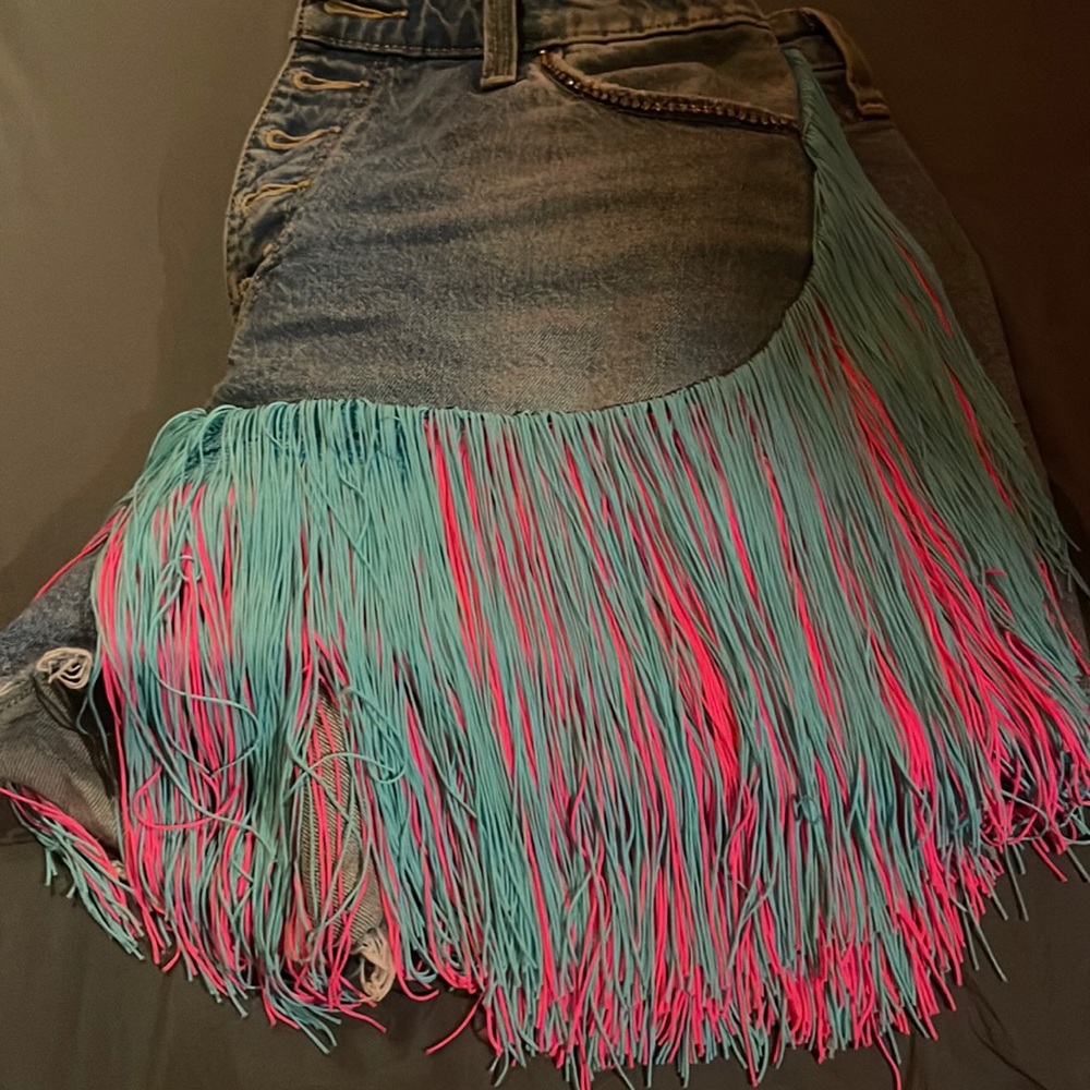short :: with diamonds on pocket area ::: pink and blue tassel coming down side